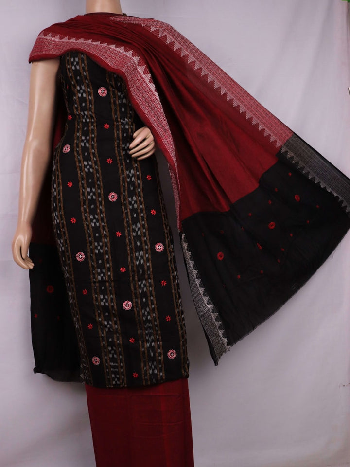 Fourth image in the series: Handloom cotton Sambalpuri dress material in black and maroon, featuring intricate motif patterns on the blouse piece.