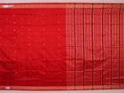 Close-up of the distinct handwoven texture of a red Sambalpuri silk saree with Butta pattern.