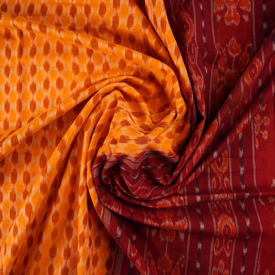 Full styling view of a model draped in a yellow and maroon Sambalpuri cotton saree with motifs.
