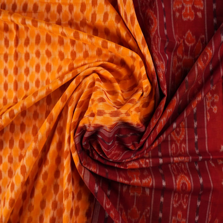 Full styling view of a model draped in a yellow and maroon Sambalpuri cotton saree with motifs.