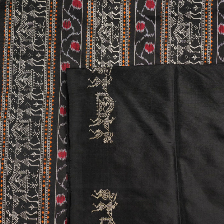 Macro close-up of Bomkai Silk Saree fabric, showing intricate brown & black silk weave.