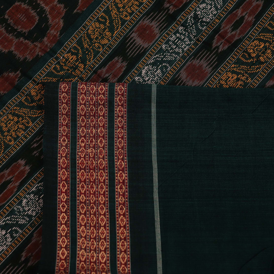 Full view of a maroon cotton Bomkai saree with green butta pattern throughout.