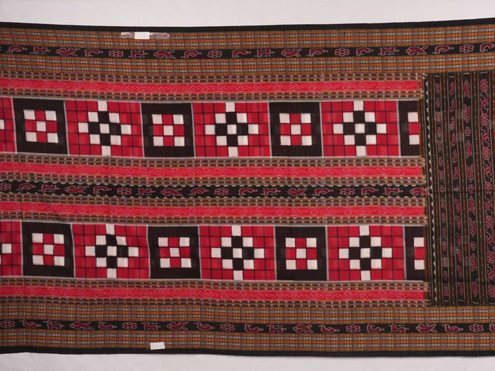 Model draped in a maroon and black pasapalli Sambalpuri cotton saree showcasing traditional Odisha style.