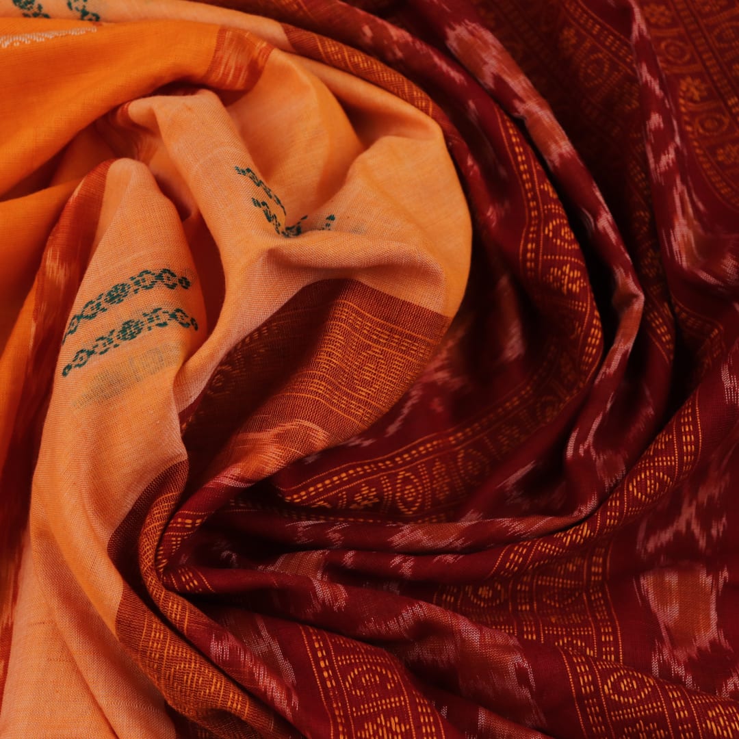 Full view of a yellow cotton Bomkai saree with maroon border and intricate butta pattern