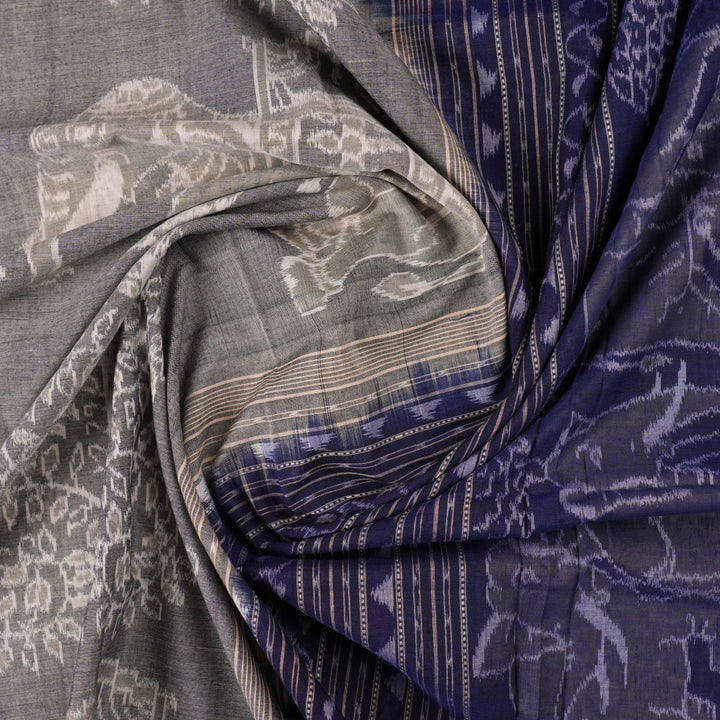 Full layout of the grey and blue Sambalpuri cotton saree displaying the body, border, and intricate pallu