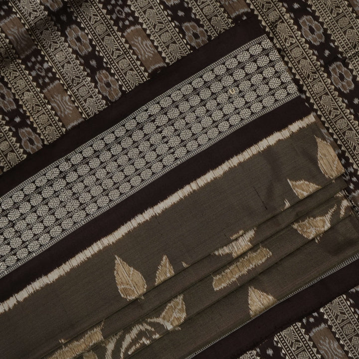 Close-up of the grey and black Sambalpuri Silk Saree fabric, highlighting its rich silk texture and weave.
