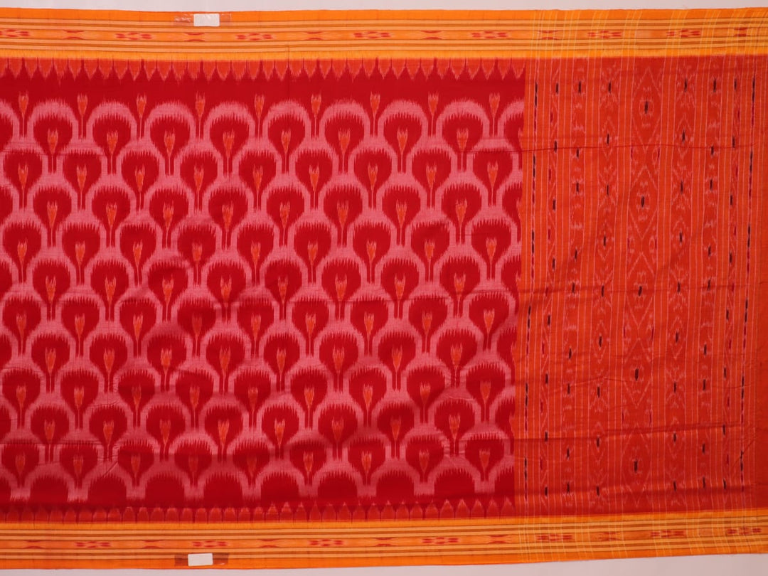 Red and yellow Sambalpuri cotton saree with motifs, elegantly draped to showcase its style.