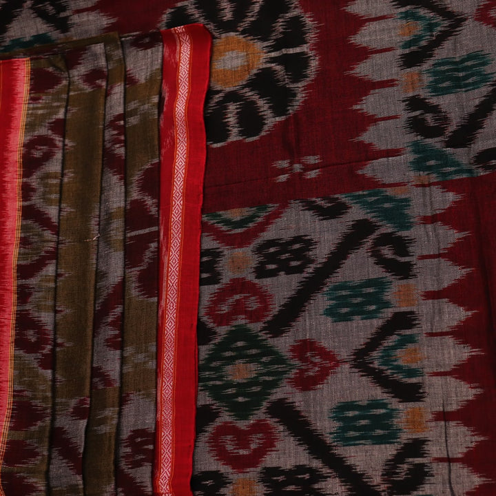 Green and Red Cotton Sambalpuri Saree Draped in a Stylized Manner