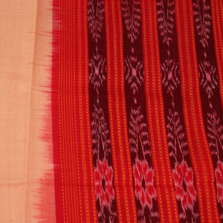 Cream-colored cotton Sambalpuri dupatta with red plain body and contrasting border, elegantly draped