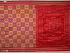 Close-up of multicolored silk Sambalpuri saree fabric showing intricate handloom weave texture.