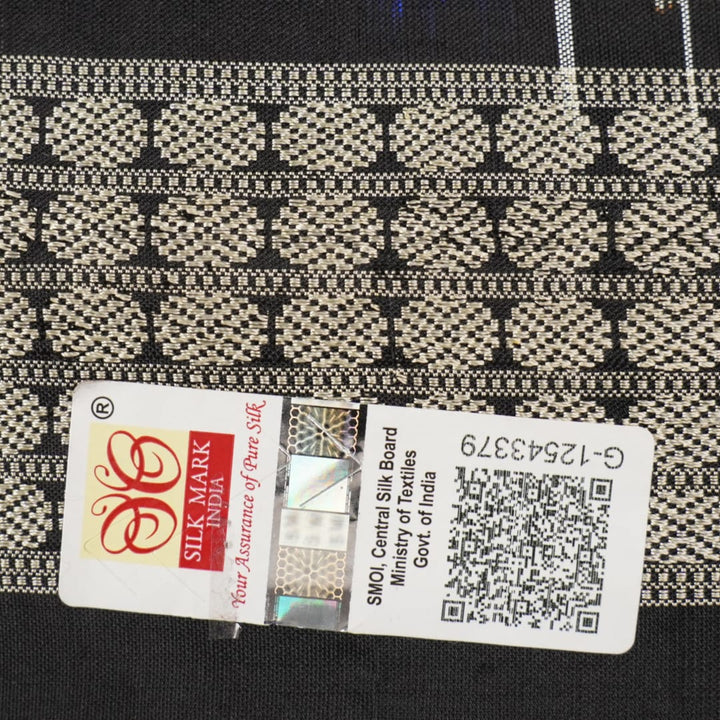 Close-up showing the rich, handloom silk texture and intricate multi-color Utkallaxmi weave with motifs.