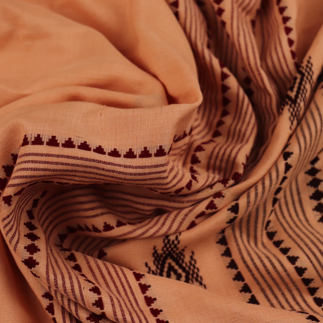 Full view of a cream-colored handloom Kotpad cotton saree with maroon butta patterns