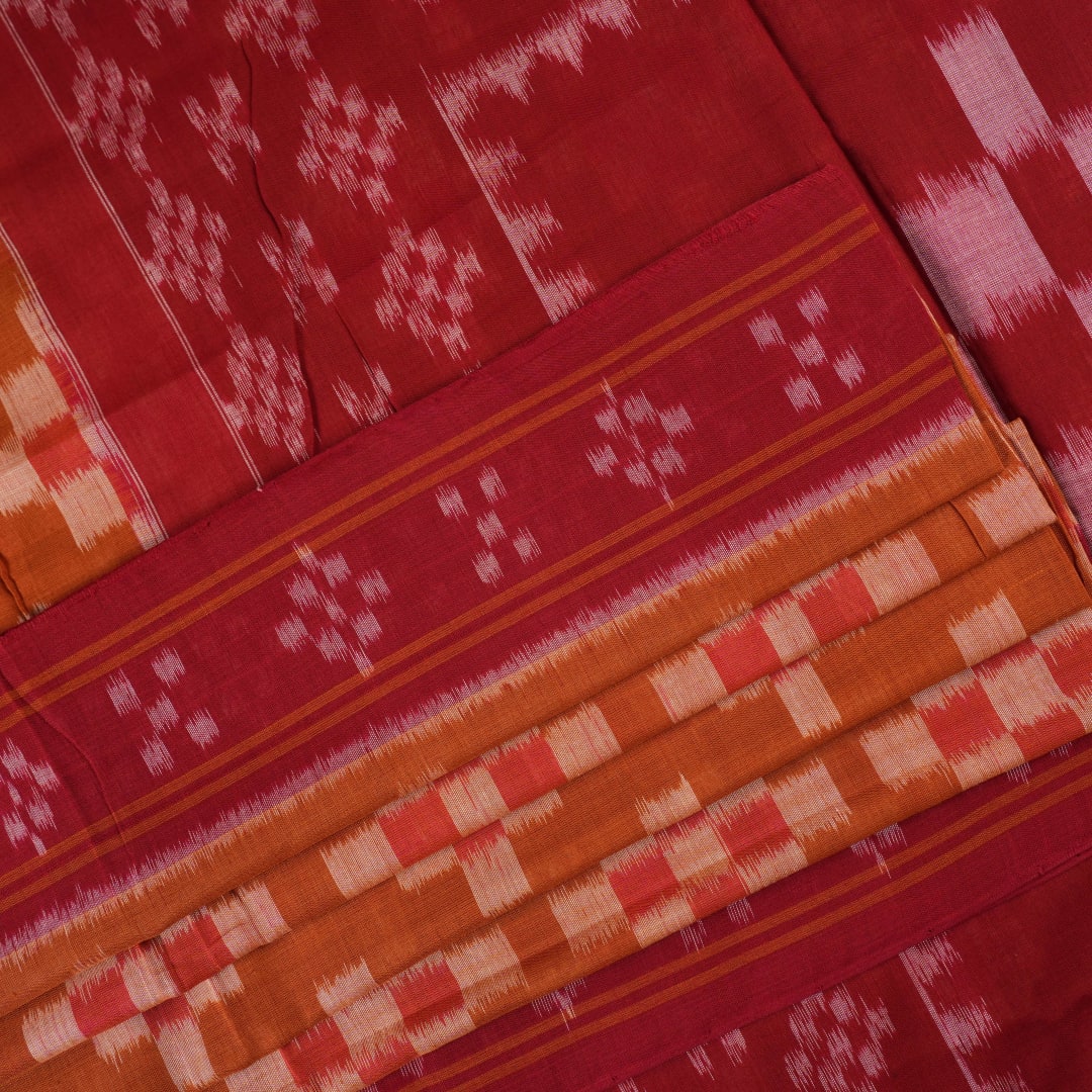 Full drape styling of a brown and maroon Sambalpuri cotton saree with motifs, modeled for elegant look.