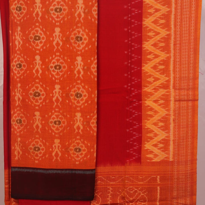 Detail of the rust and red Sambalpuri cotton dress material's blouse piece with motifs.