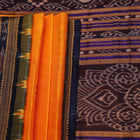 Fashionable Yellow and Blue Silk Khandua Saree with Butta Pattern and Elegant Draping Style