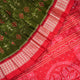 Close-up showing the rich, smooth texture of the green Sambalpuri Silk Saree's weave, highlighting its quality.