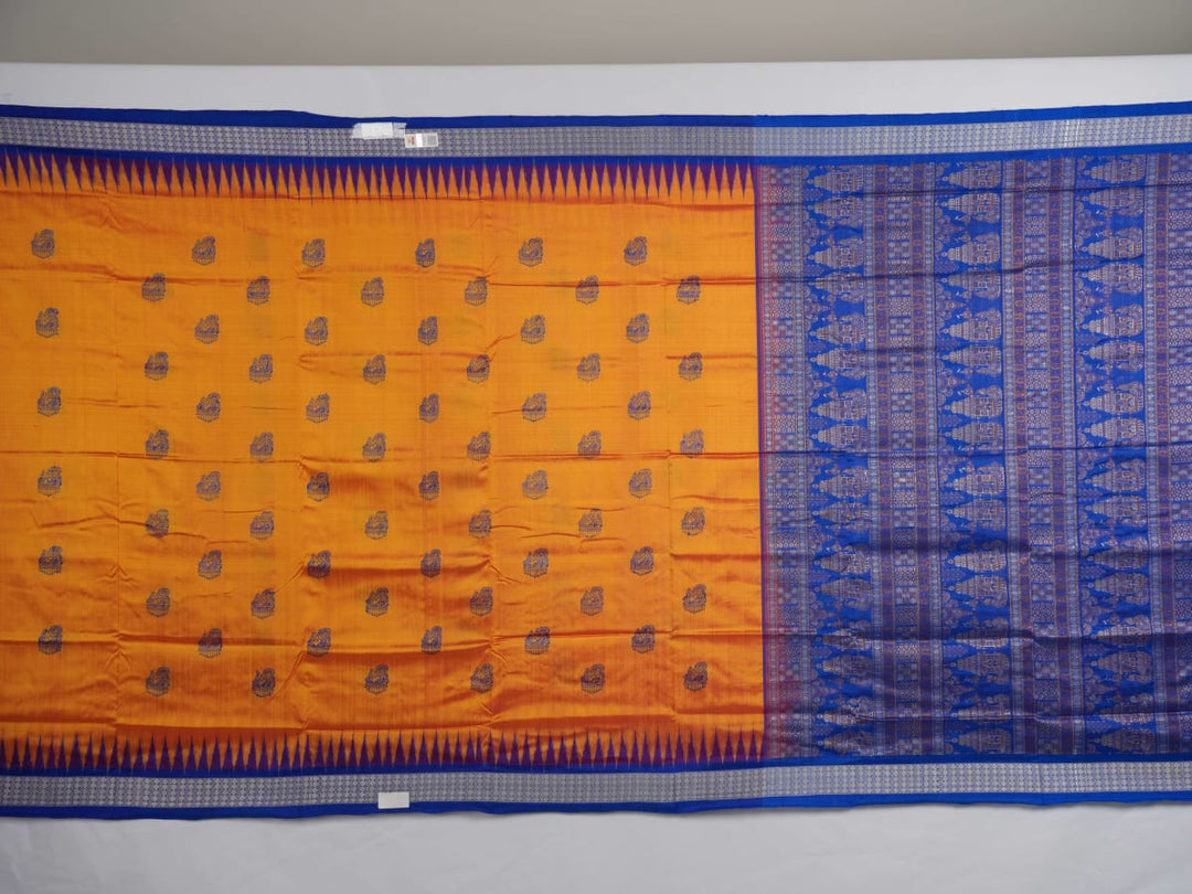 Close-up of Bomkai Silk Saree fabric texture and handloom weave in orange and blue threads.