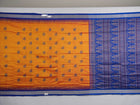 Close-up of Bomkai Silk Saree fabric texture and handloom weave in orange and blue threads.
