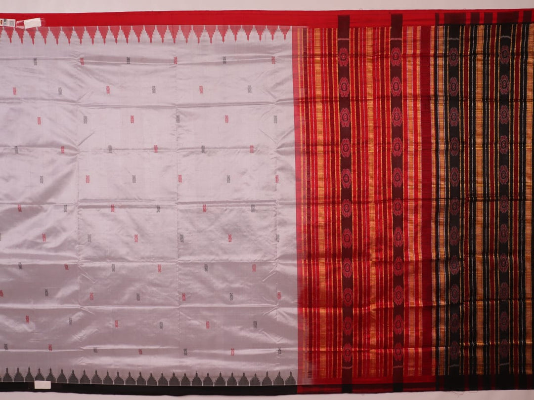 Close-up of grey and red Sambalpuri Silk saree fabric texture, highlighting butta pattern weave.
