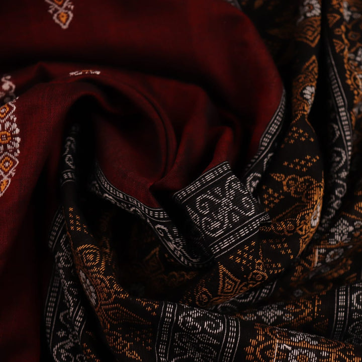 Full view of maroon cotton Bomkai saree with black butta patterns