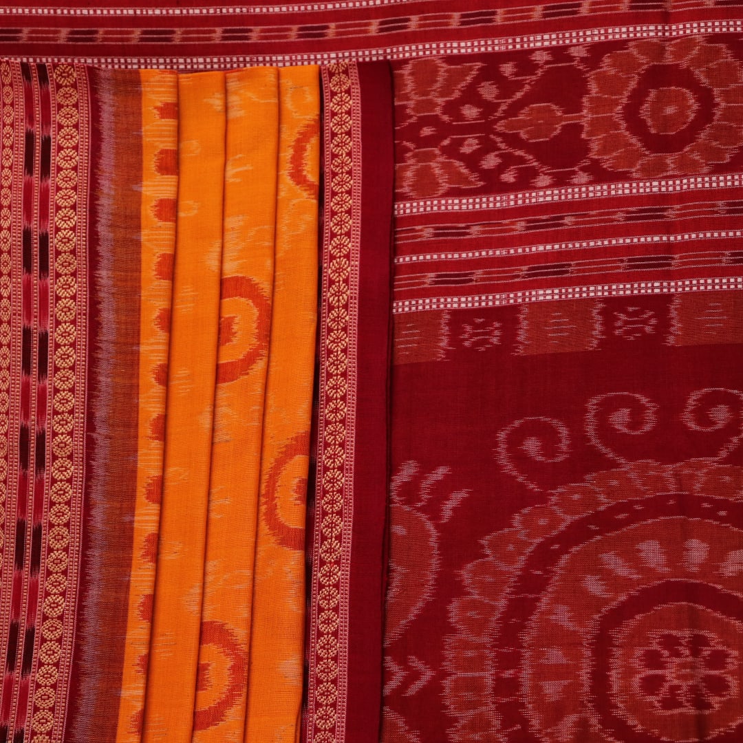 Full view of a vibrant yellow cotton Sambalpuri saree with maroon motifs and intricate border design