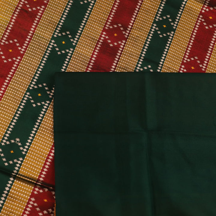 Close-up of yellow & green Sambalpuri Silk Saree fabric texture, showing Butta pattern.