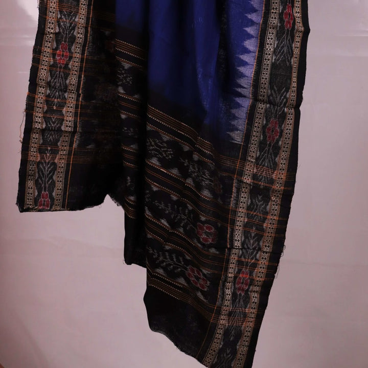 Model in a blue and black Sambalpuri cotton dupatta with a plain pattern