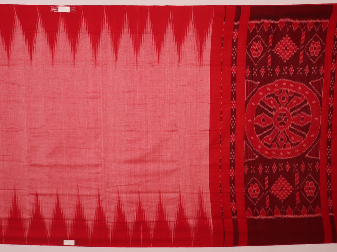 Pink and red Sambalpuri cotton saree draped; showcases overall look and styling with motifs visible.