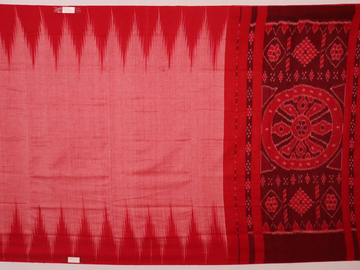 Pink and red Sambalpuri cotton saree draped; showcases overall look and styling with motifs visible.