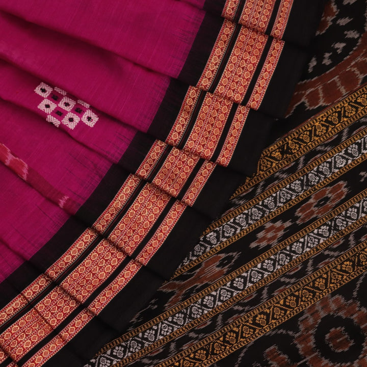 A full-length view of a vibrant magenta cotton Bomkai saree adorned with intricate black motifs.