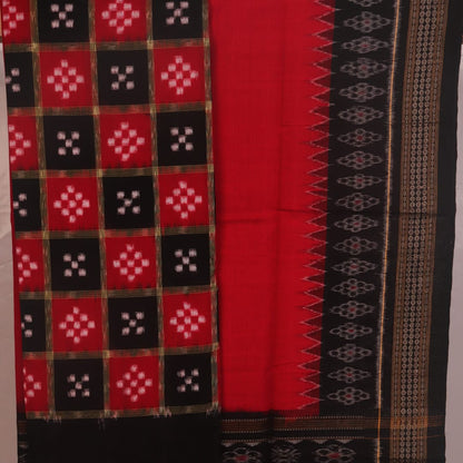 Detail of the black Sambalpuri cotton Pasapalli dress material's blouse piece with red accents.