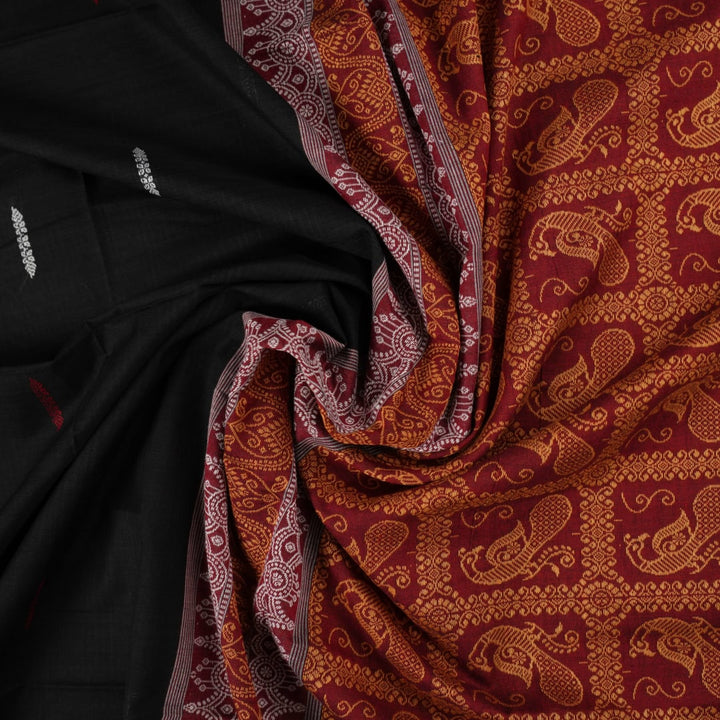 Full flat layout of the black and maroon Bomkai cotton saree with traditional butta patterns and pallu.