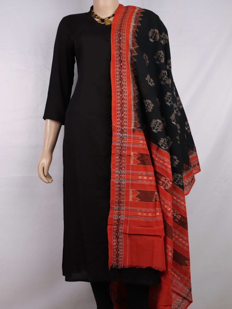 Black cotton Sambalpuri dupatta with rust motifs, styled on a mannequin