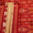 Saree styling: Cream Khandua silk saree with maroon butta pattern draped elegantly.