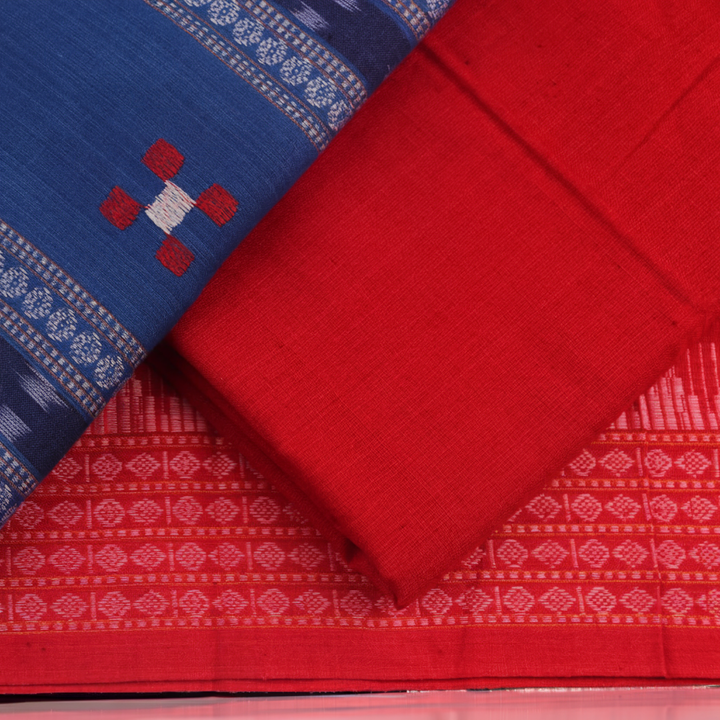 Sambalpuri cotton dress material: Close-up of blue blouse piece with red motifs.