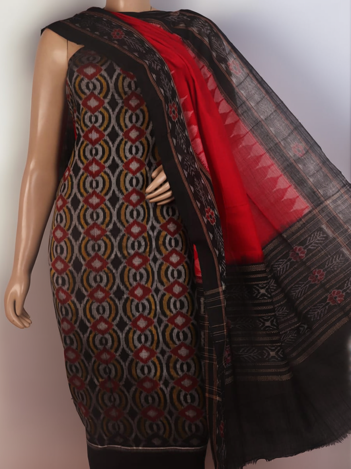 Detail of the black and red motif blouse piece of the Sambalpuri cotton dress material.