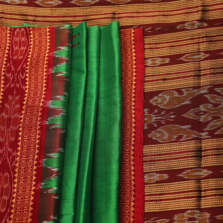 Green Khandua silk saree, styled or draped to show its overall look and fall.