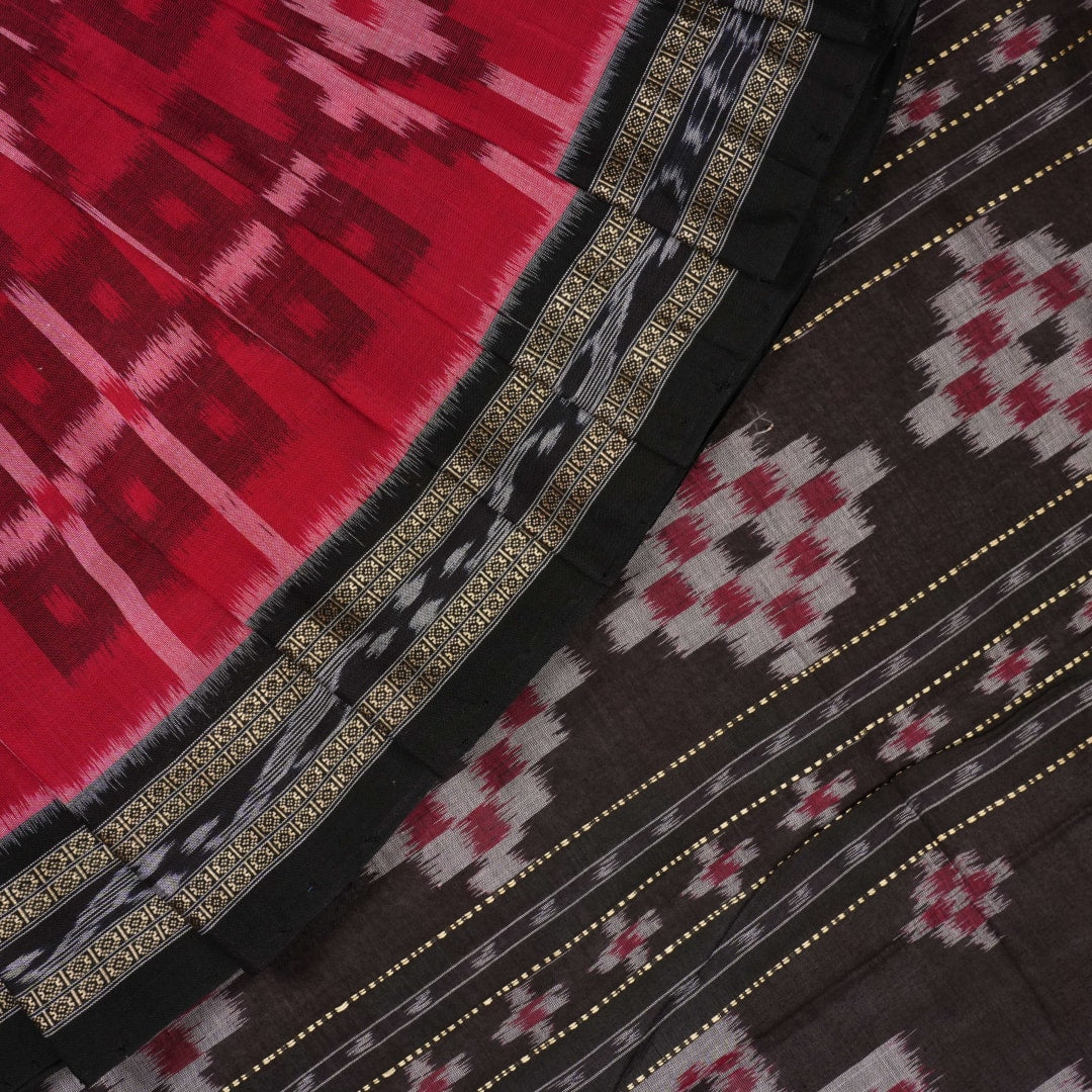 Model showcasing an elegant drape of a red and black Sambalpuri cotton handloom saree with traditional motifs