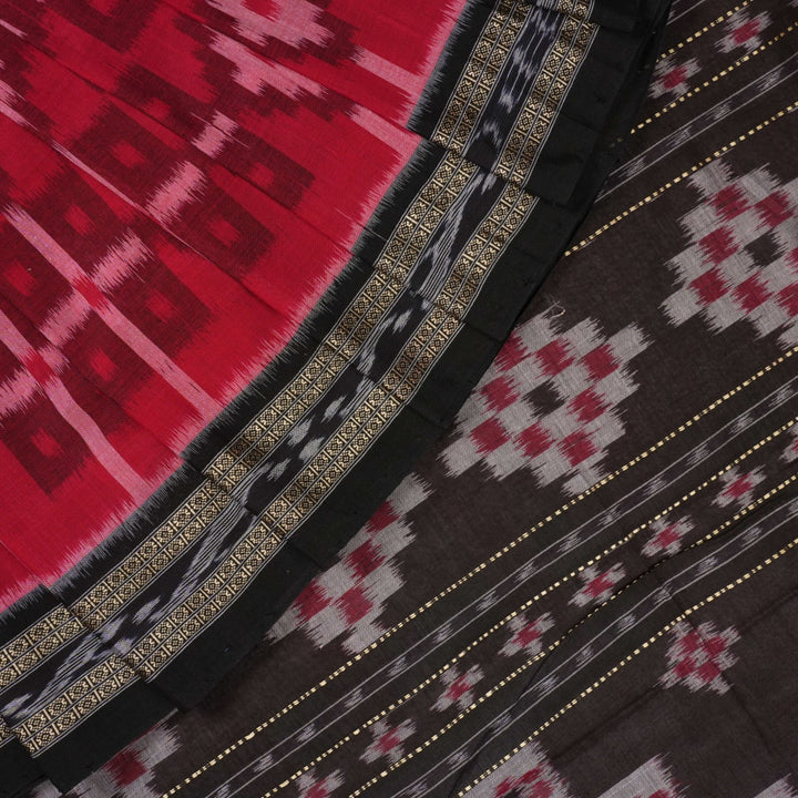 Model showcasing an elegant drape of a red and black Sambalpuri cotton handloom saree with traditional motifs