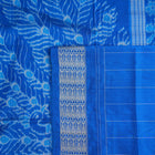 Close-up of Sambalpuri Silk saree fabric, revealing its rich texture and intricate black and blue weave.